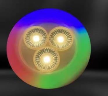 Circular light fixture with three glowing bulbs on a dark background

