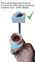 Hand holding a device with a black mark for sensor sensitivity, labeled 'Customer Care' with a phone number.