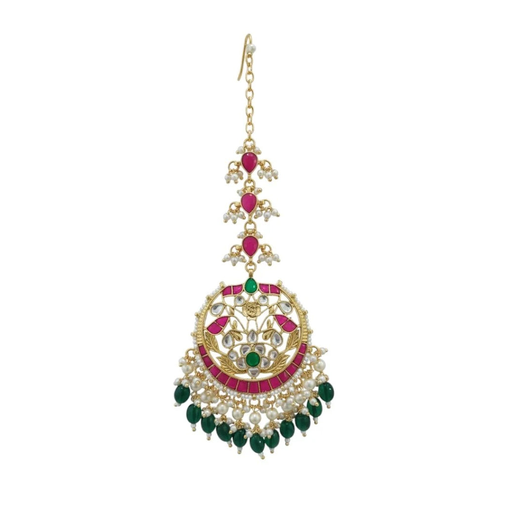 Decorative earring with gold, green, and red elements on a white background

